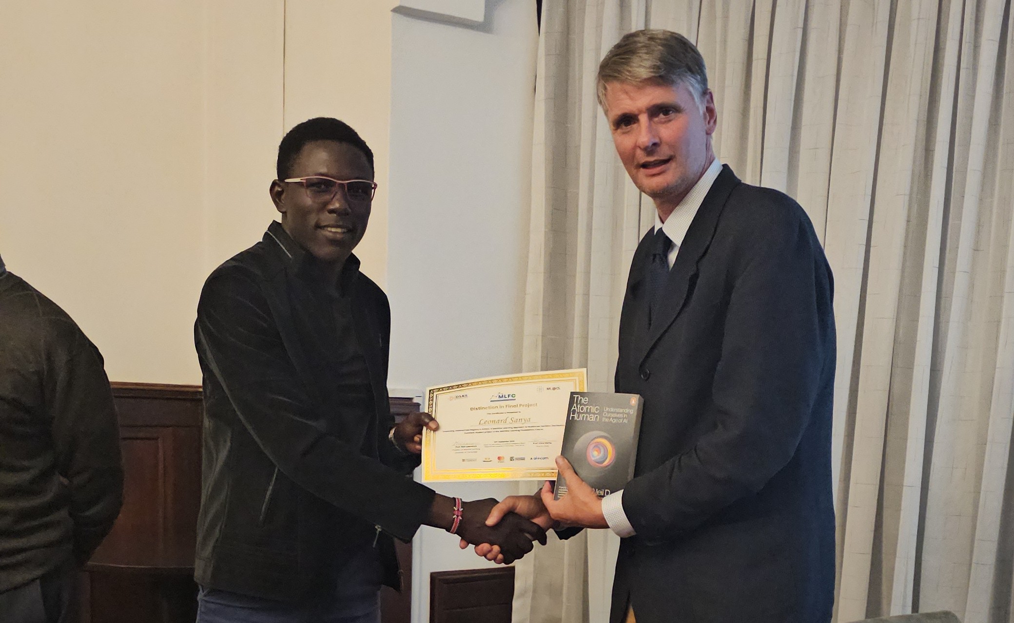 Leonard receiving prize
